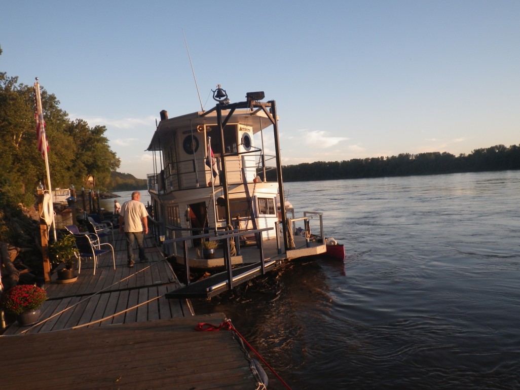 note canoe docked on boat